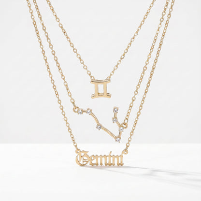 Zestaw 3 złotych naszyjników ze znakiem zodiaku Bliźniąt.