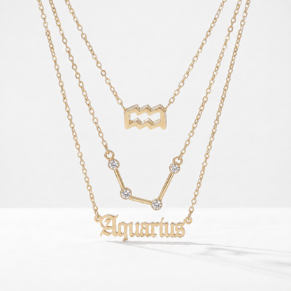 Zestaw 3 złotych naszyjników ze znakiem zodiaku Wodnika.